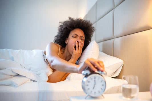 woman who wants to sleep but takes her medication first