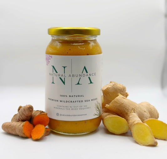 Jar of Natural Abundance sea moss with turmeric and ginger on a white background